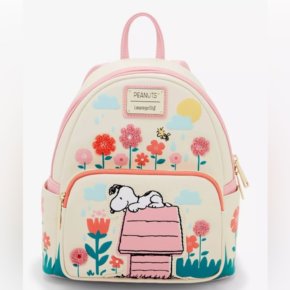 Loungefly Handbags - Loungefly Peanuts Floral Backpack with Pink Accents